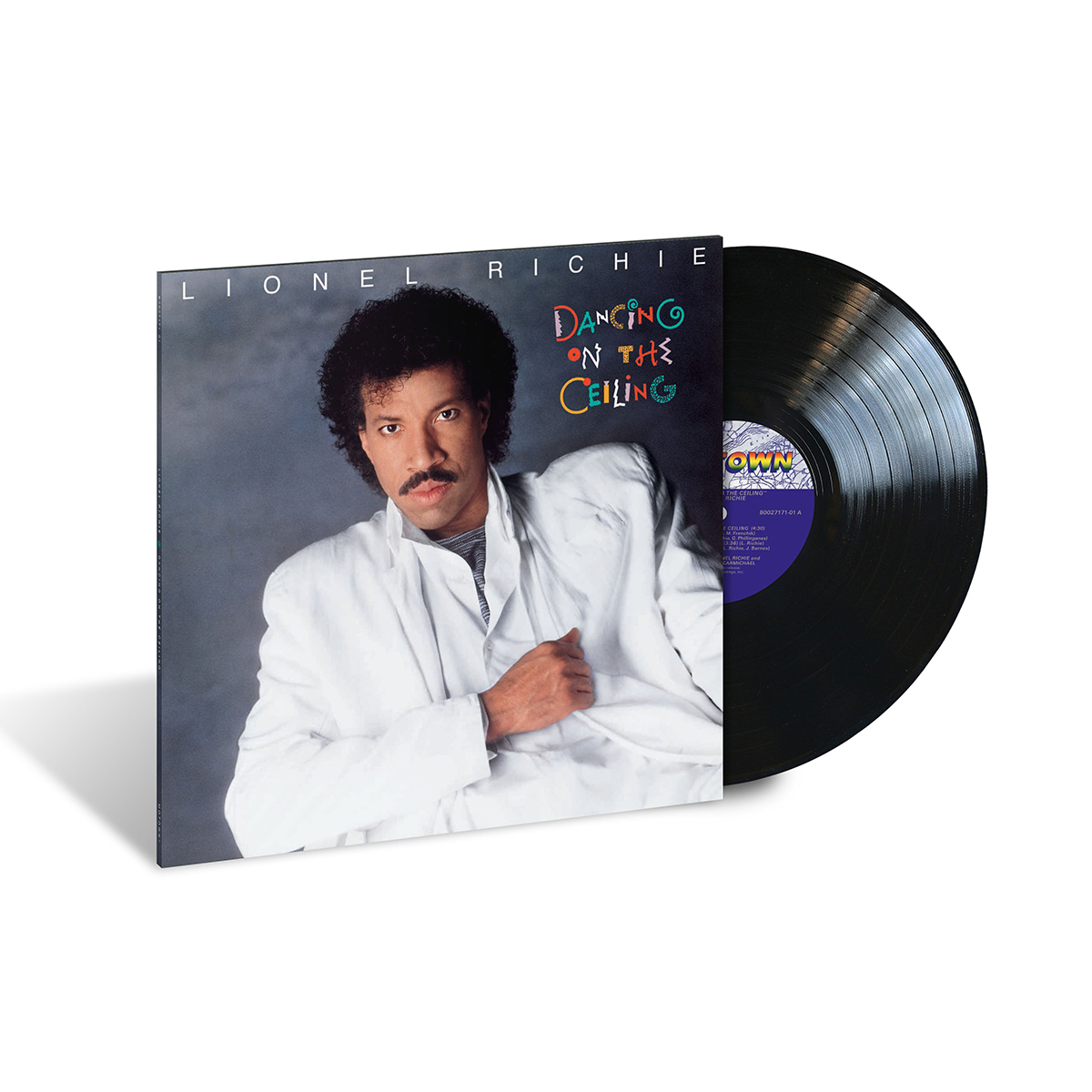 Lionel Richie's 'Dancing on the Ceiling' vinyl record album, showing the front cover with the artist in a white jacket and the black vinyl record partially pulled out.