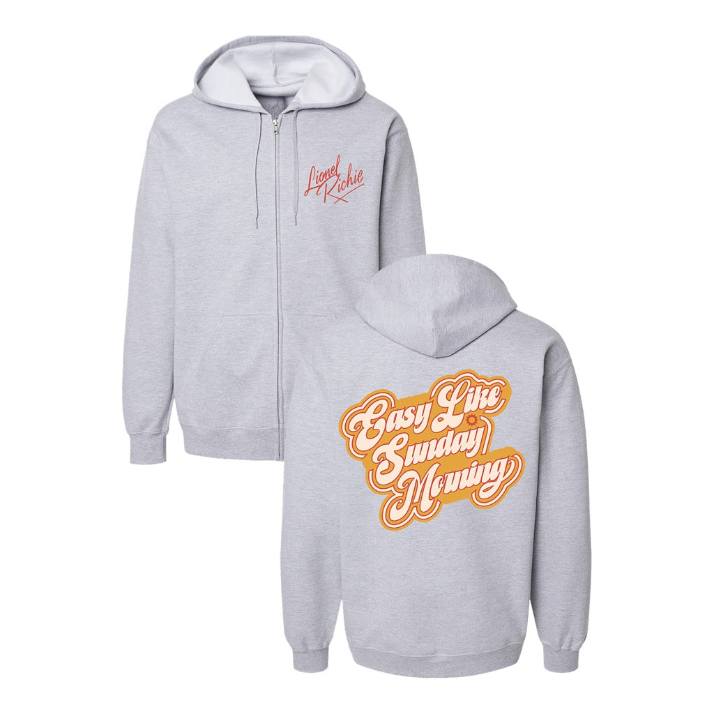 Classic fitting unisex zip up hoodie in grey featuring a red Lionel Richie logo on the front chest and "Easy Like Sunday Morning" print in orange and red on back